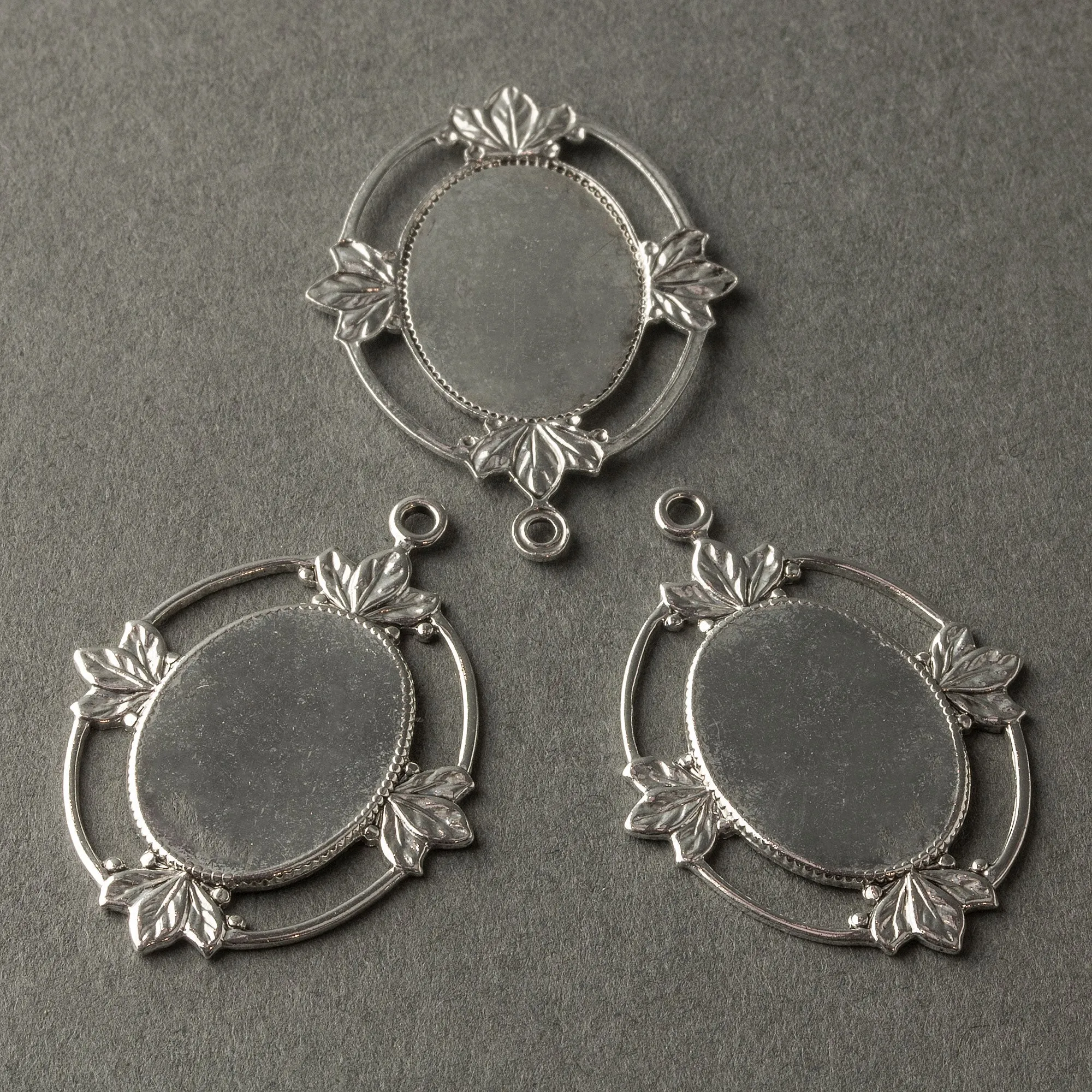 silver plated brass frame setting for 40X30mm cabochon. 1 ring. Pkg of 1 b9-0803-1s